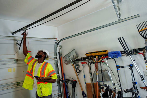 Professional Garage Door Roller Replacement technician working in Elwood, NY